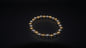 Anomi Quration: Unstoppable Confidence - Infinite Harmony Bracelet