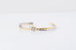 Anomi Quration: Elevated Elegance - Locked in Strength Bangle